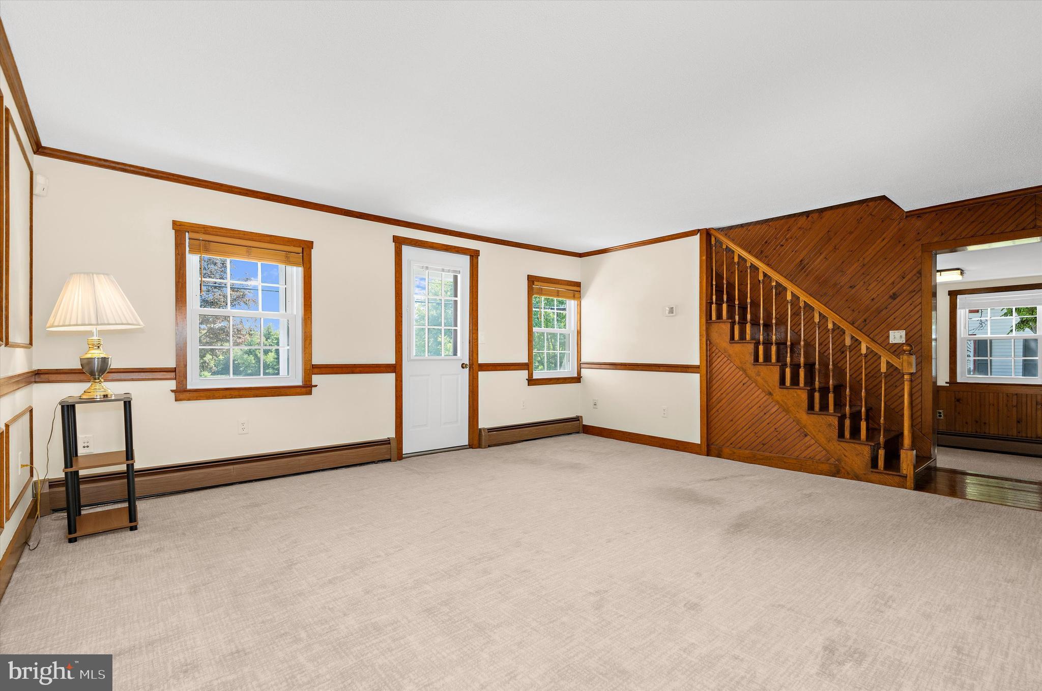 12714 Still Pond Road Still Pond, MD 21667 - Photo 10 of 62 a view of an empty room with windows & cabinet
