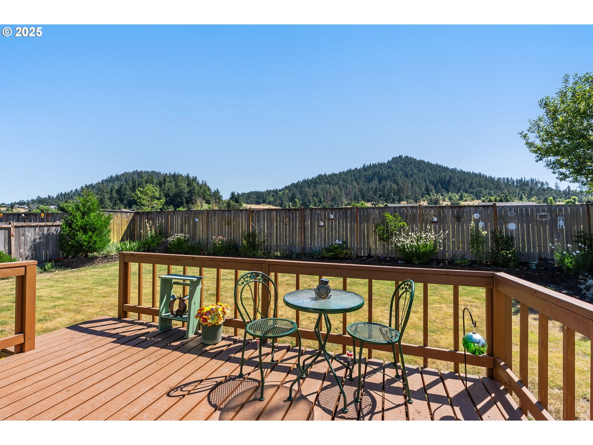 1933 South 58th Street Springfield, OR 97478 - Photo 23 of 32 a view of a chairs on the roof deck