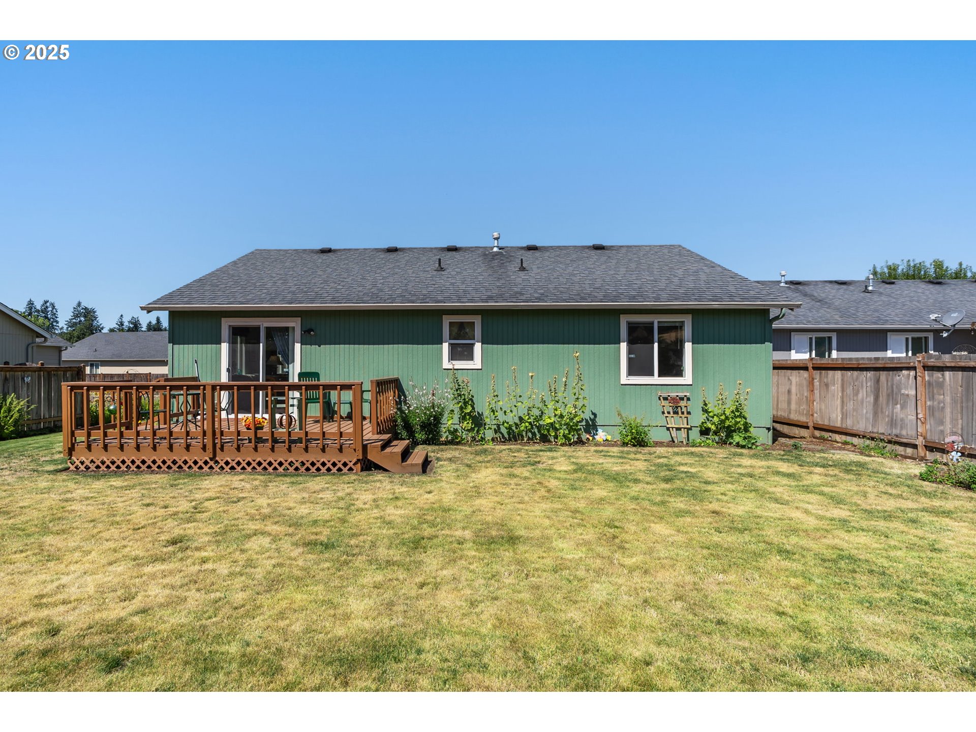 1933 South 58th Street Springfield, OR 97478 - Photo 25 of 32 a front view of a house with a garden
