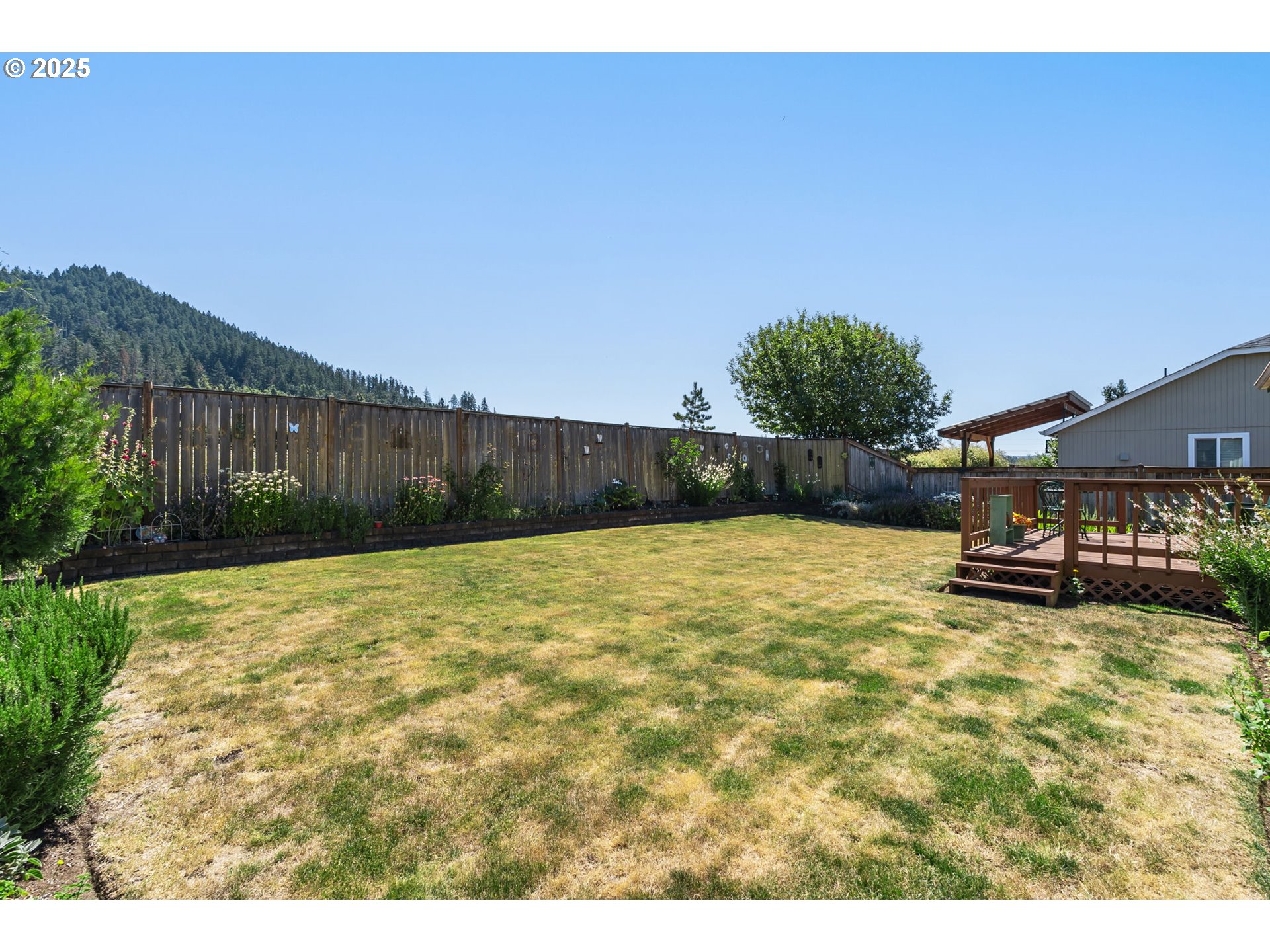 1933 South 58th Street Springfield, OR 97478 - Photo 26 of 32 a view of a backyard