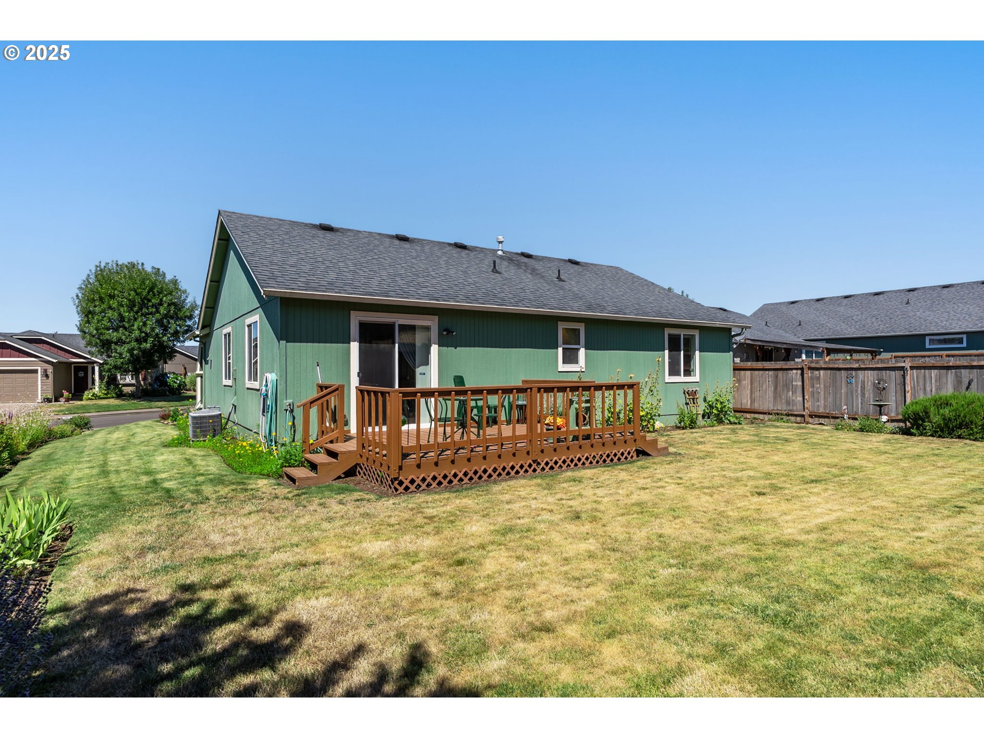 1933 South 58th Street Springfield, OR 97478 - Photo 29 of 32 a view of a house with a yard and plants