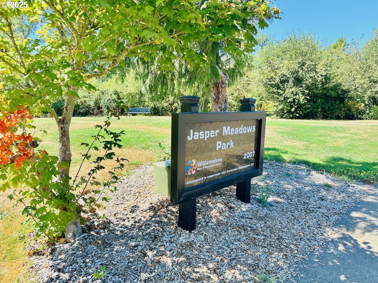 1933 South 58th Street Springfield, OR 97478 - Photo 31 of 32 a sign that is sitting in the middle of a park