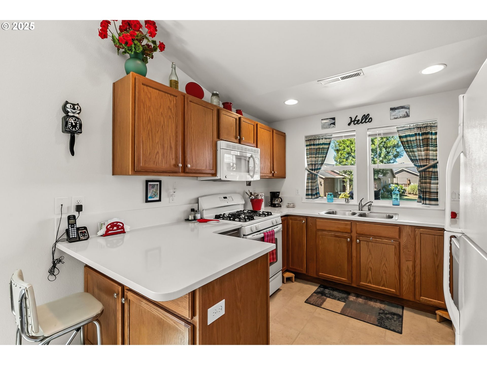 1933 South 58th Street Springfield, OR 97478 - Photo 9 of 32 a kitchen with a sink cabinets and window