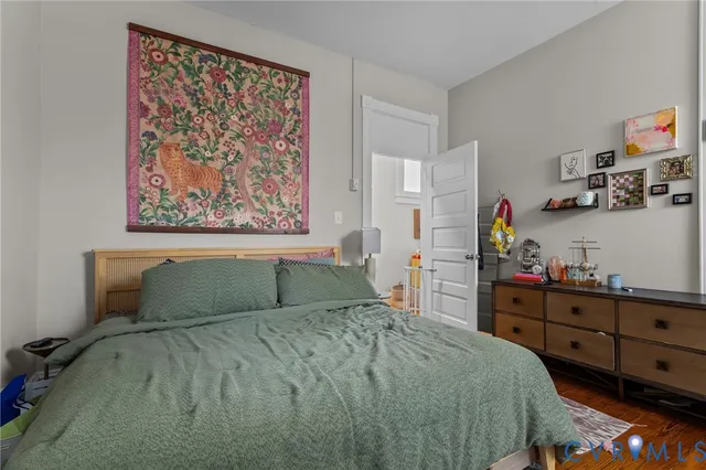 a bedroom with a bed and a cabinets