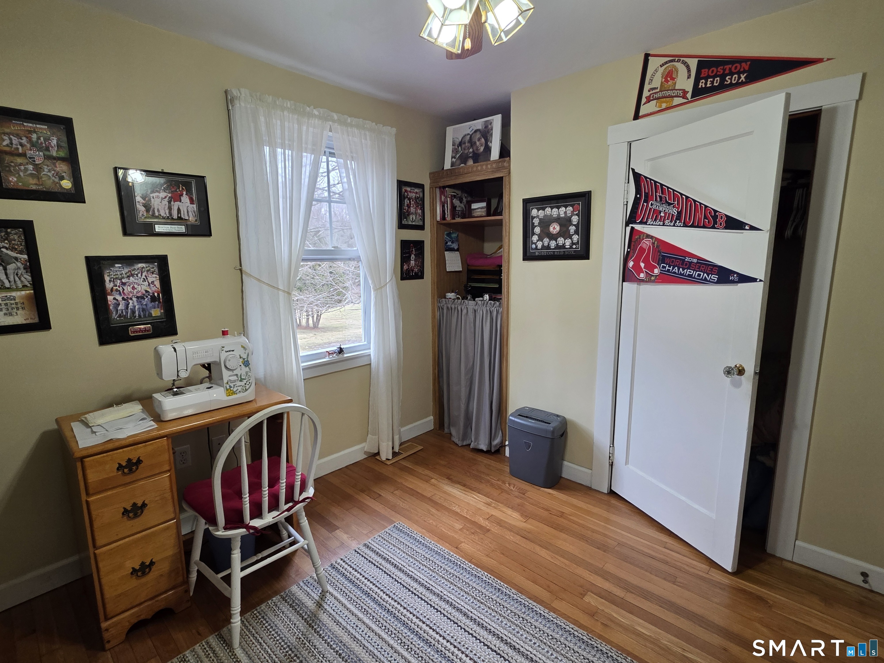 22 Pond Road Franklin, CT 06254 - Photo 17 of 34 a view of a workspace with furniture and wooden floor