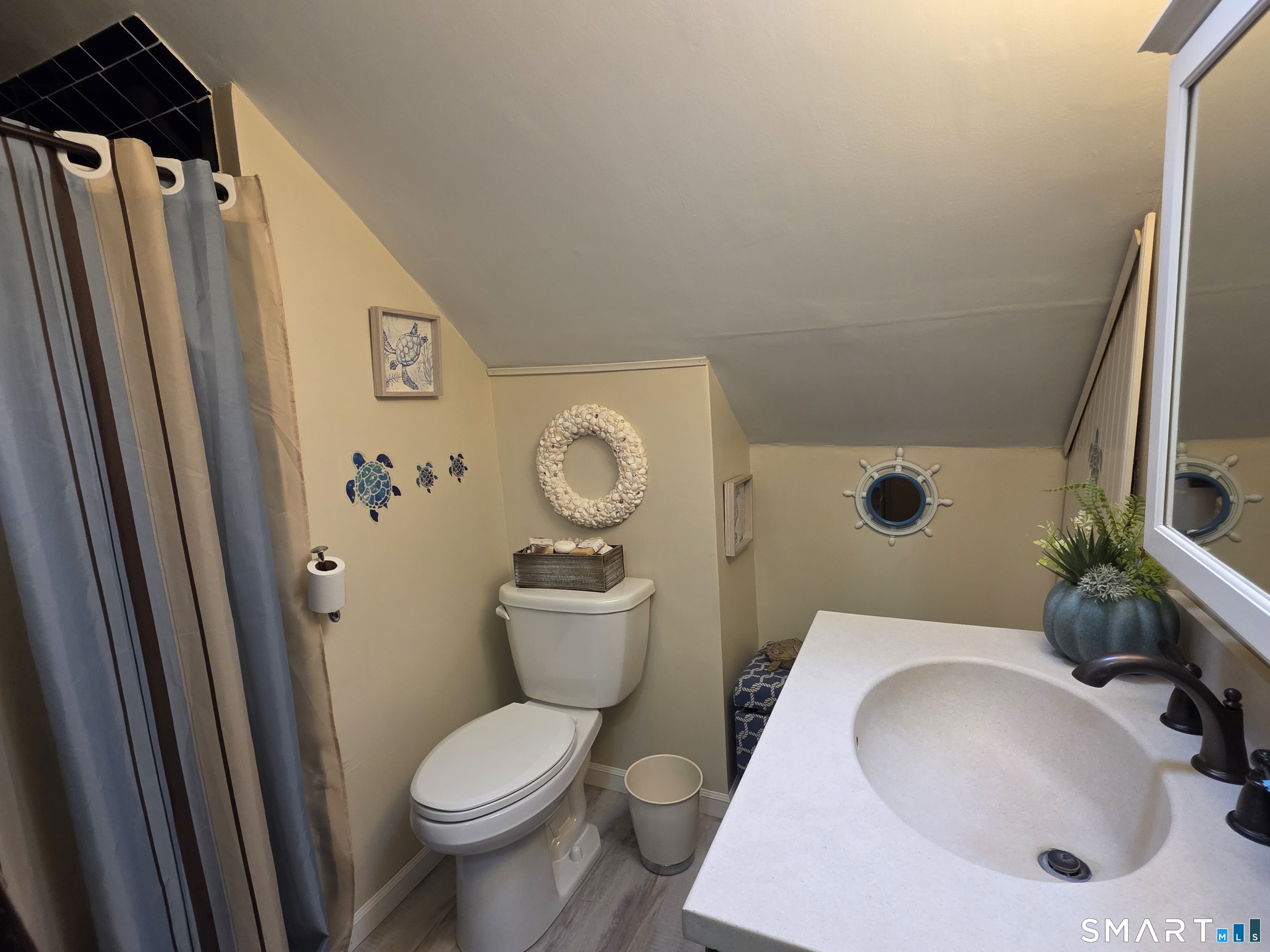 22 Pond Road Franklin, CT 06254 - Photo 25 of 34 a white toilet sitting next to a bathroom sink