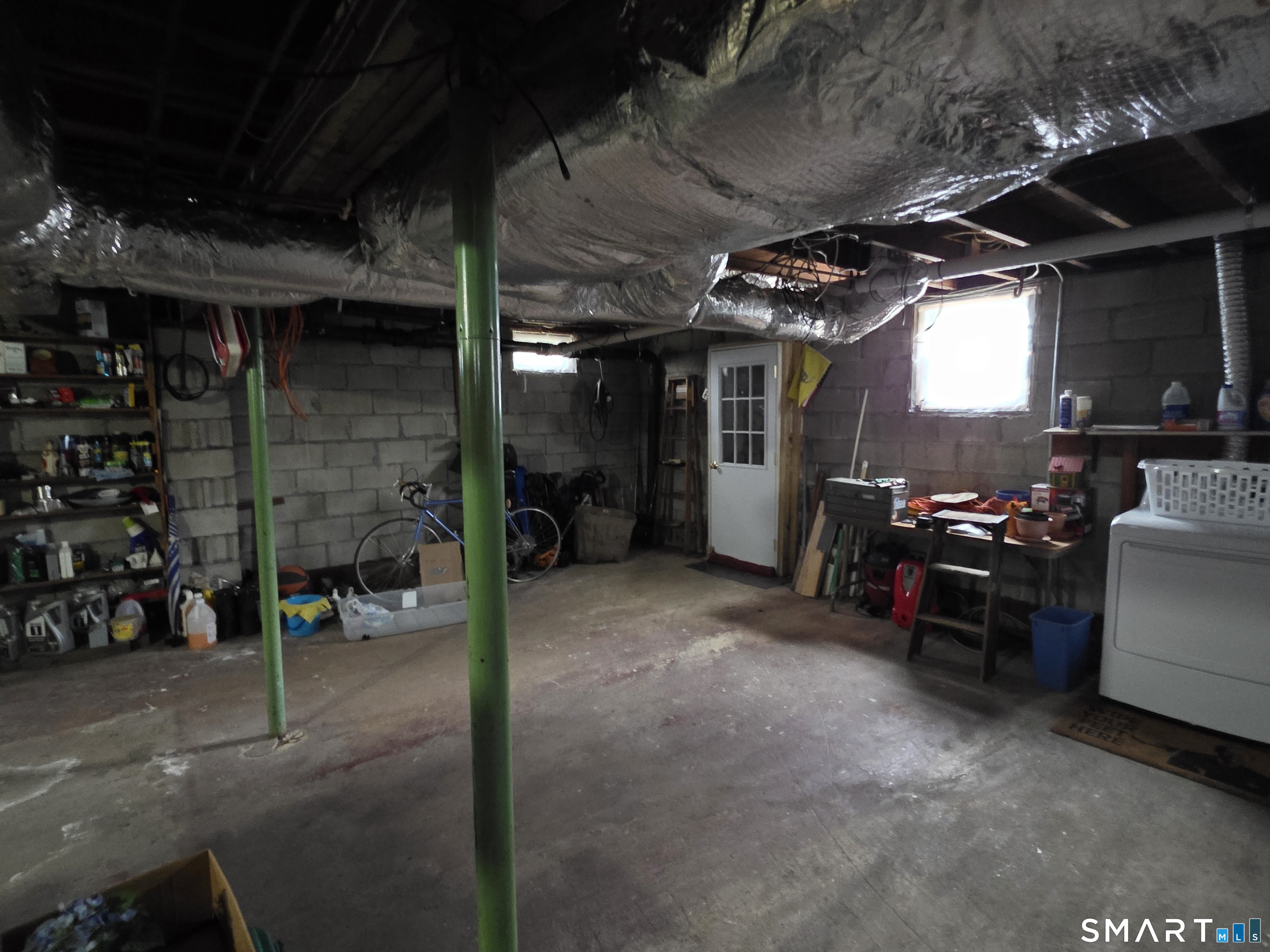 22 Pond Road Franklin, CT 06254 - Photo 27 of 34 a view of a garage with a white car parked