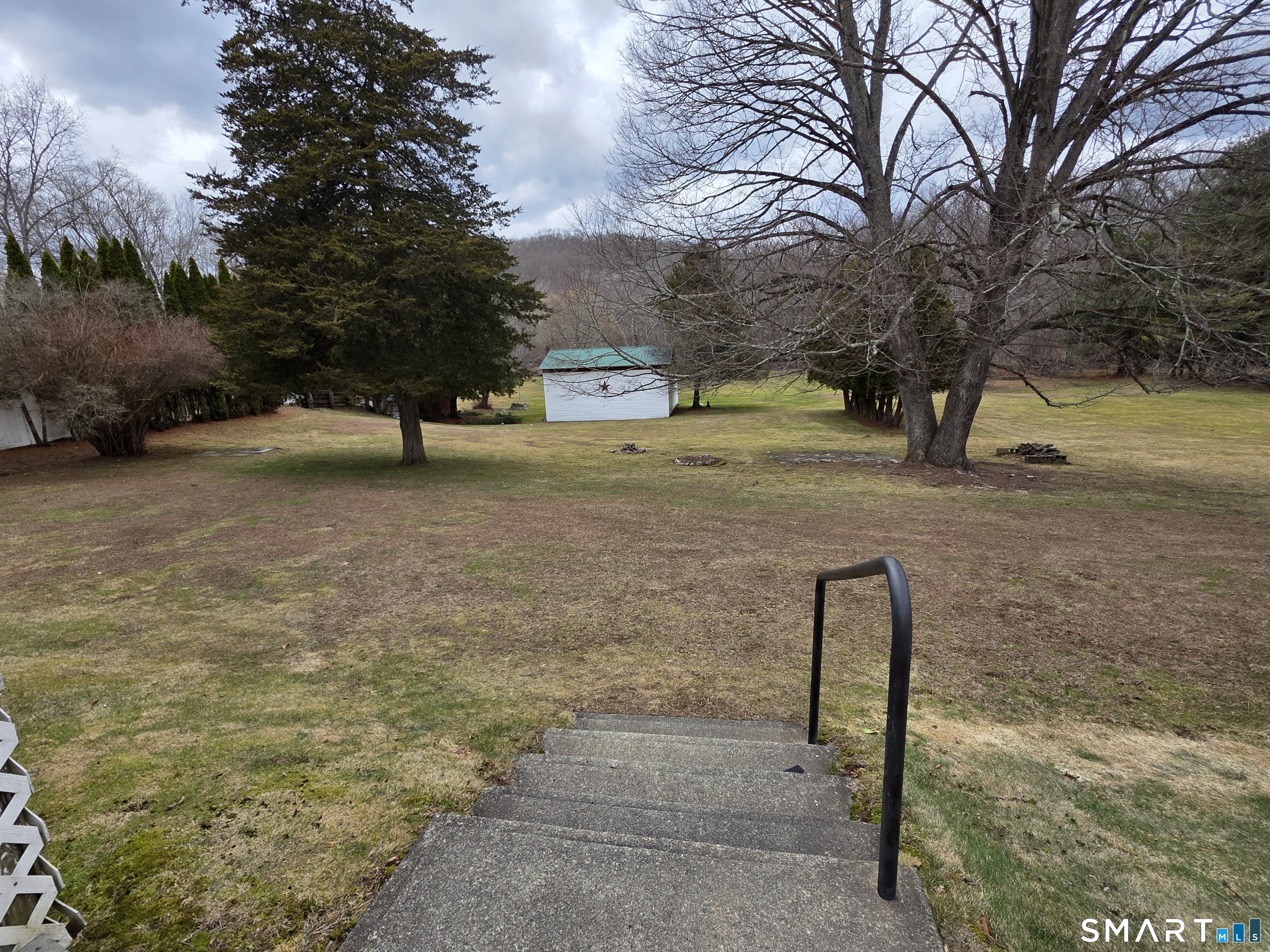 22 Pond Road Franklin, CT 06254 - Photo 28 of 34 a backyard of a house with lots of green space