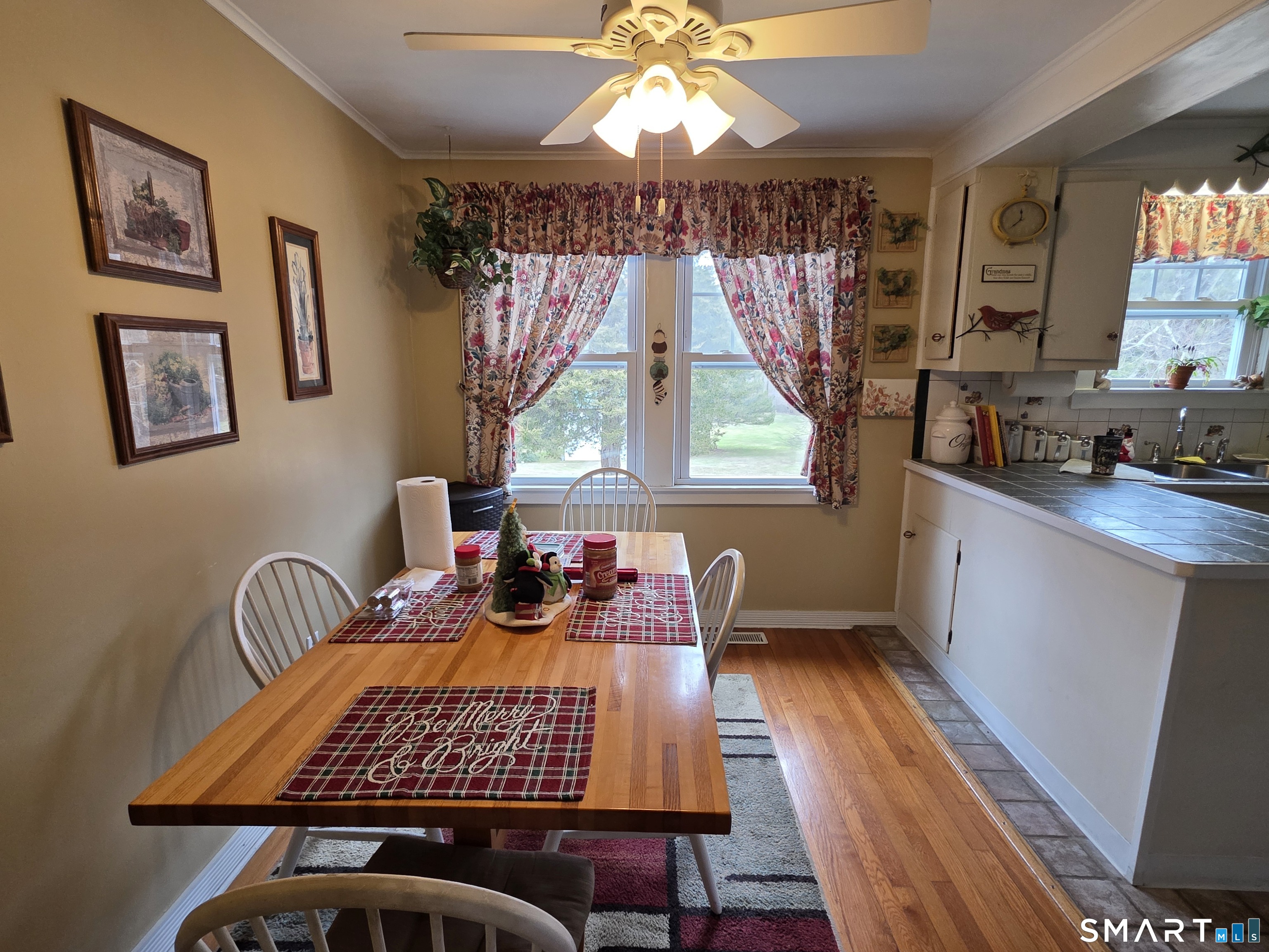 22 Pond Road Franklin, CT 06254 - Photo 3 of 34 a bedroom with a bed and wooden floor