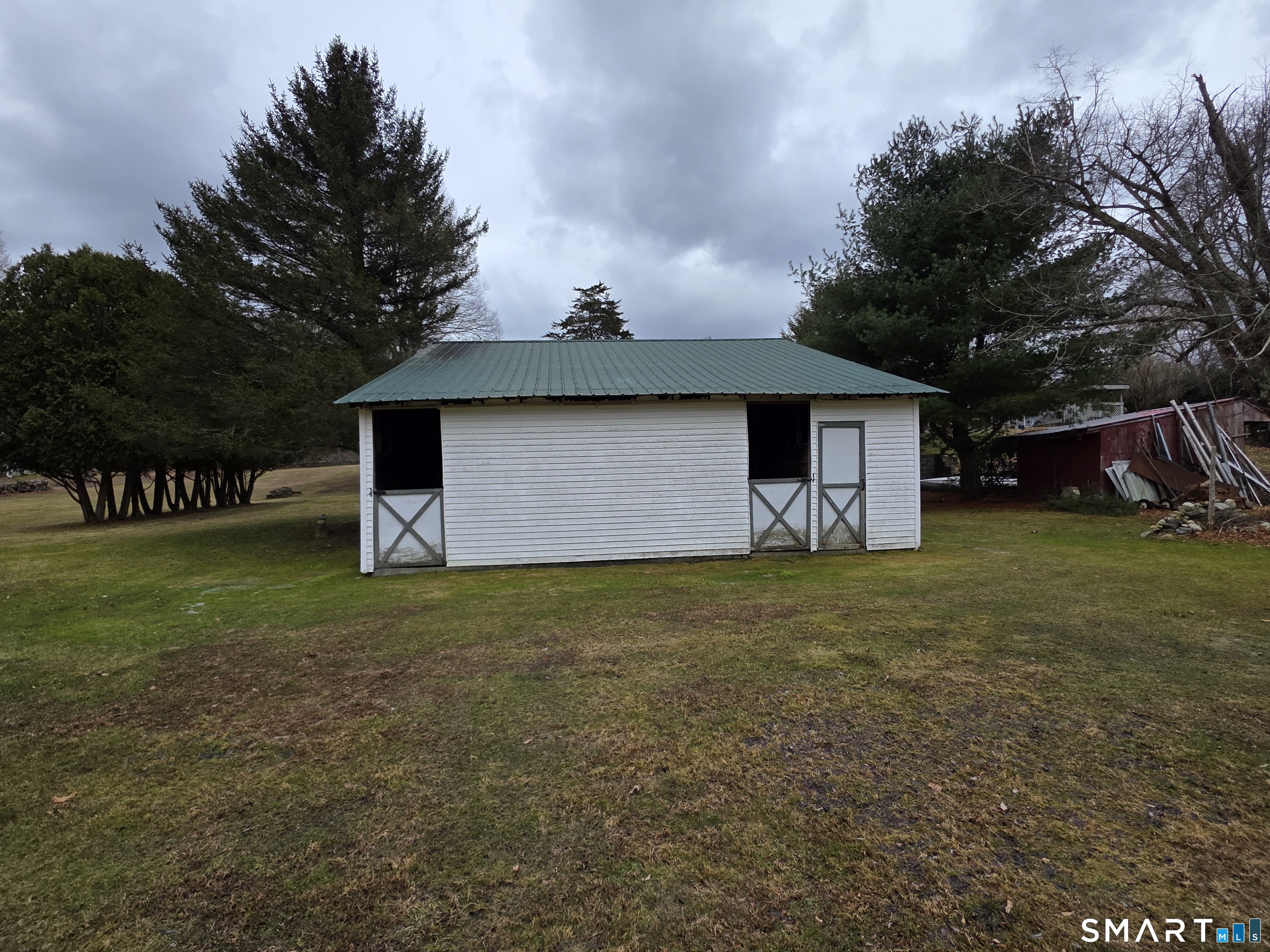 22 Pond Road Franklin, CT 06254 - Photo 31 of 34 a front view of a house with garden