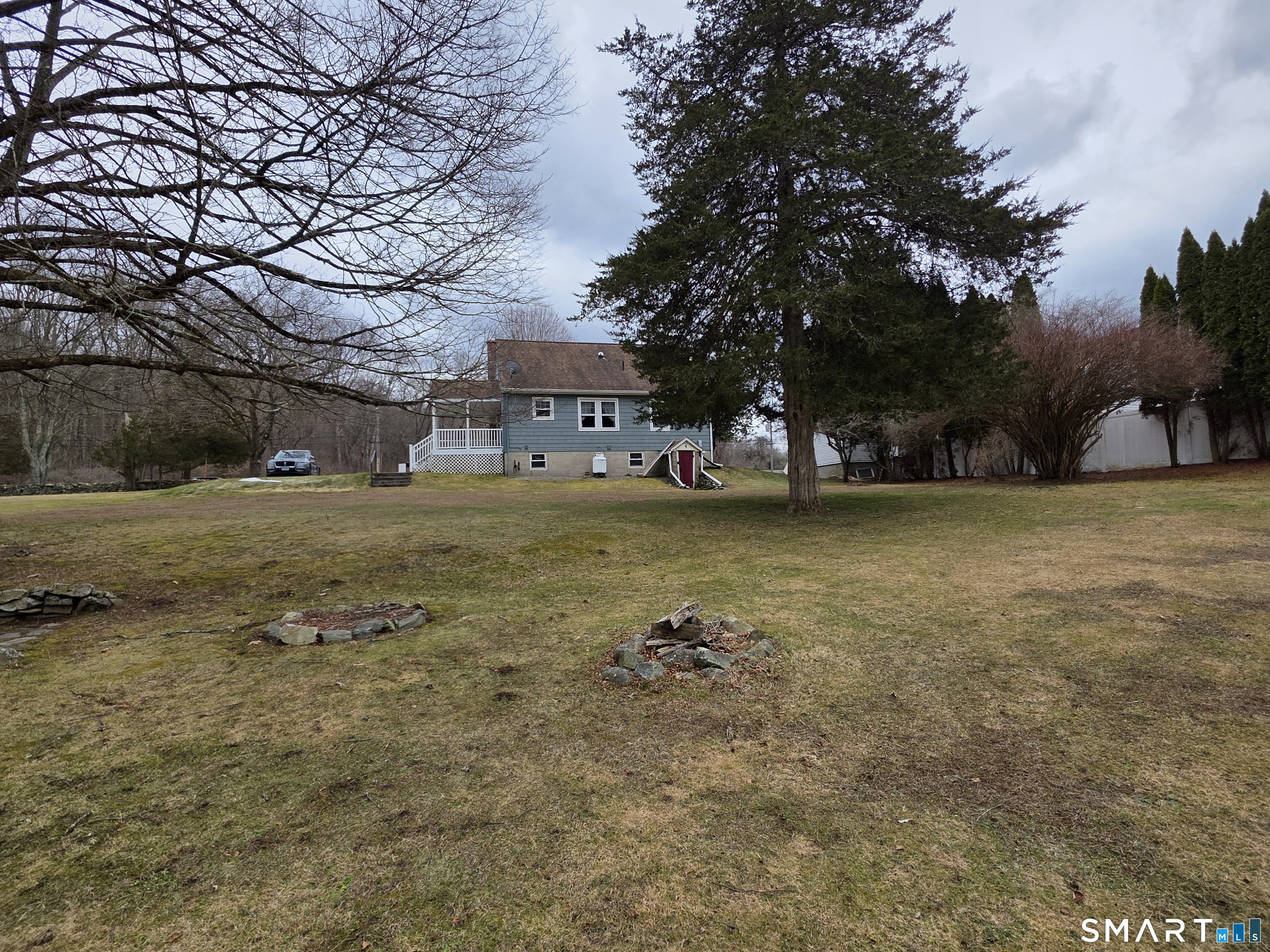 22 Pond Road Franklin, CT 06254 - Photo 32 of 34 a view of a large body of water with water fall