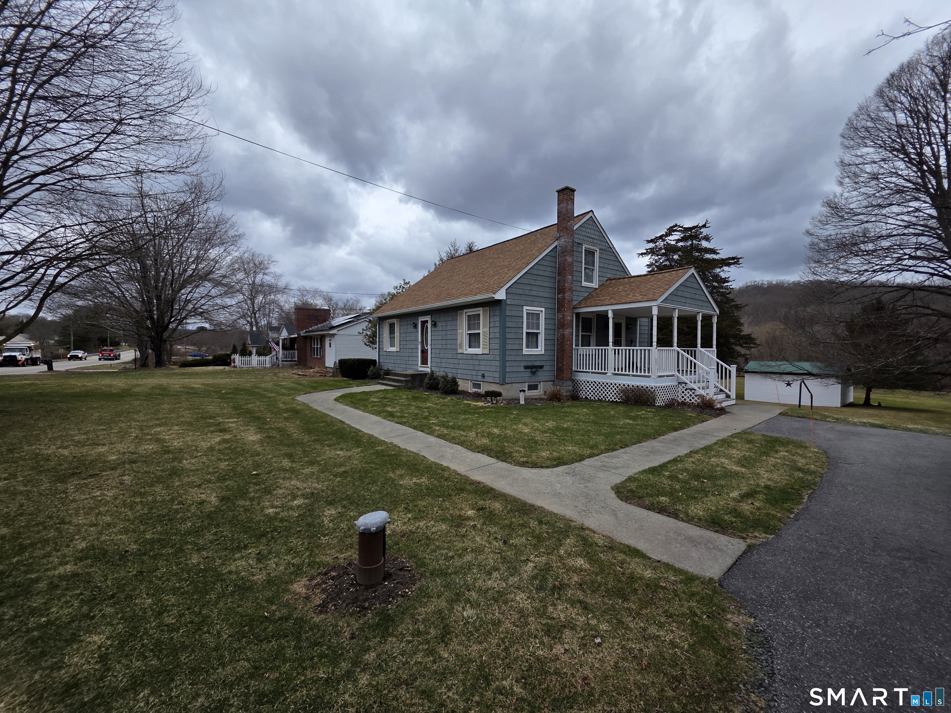 22 Pond Road Franklin, CT 06254 - Photo 34 of 34 a front view of a house with a yard