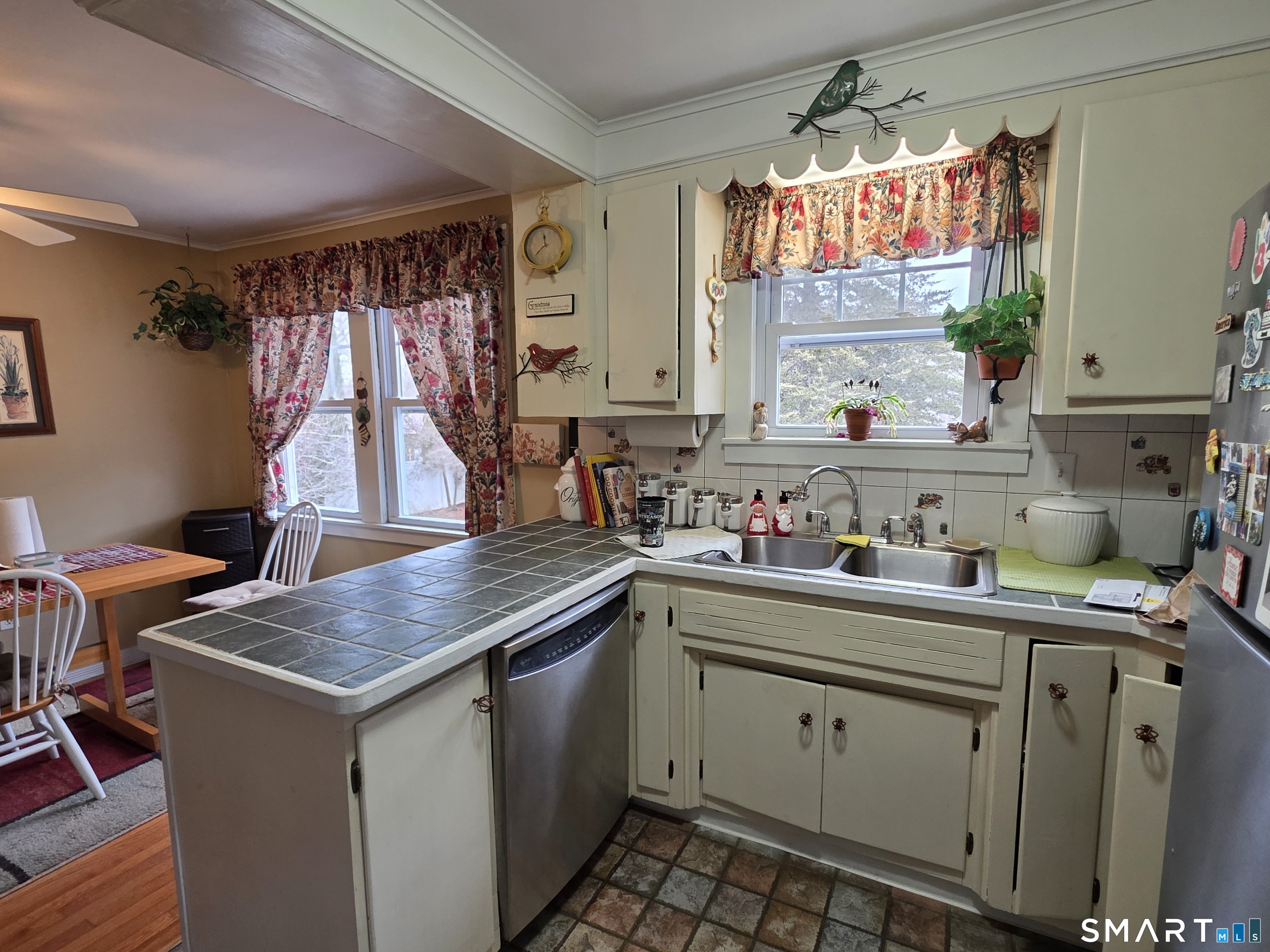 22 Pond Road Franklin, CT 06254 - Photo 5 of 34 a kitchen that has a sink and a stove in it