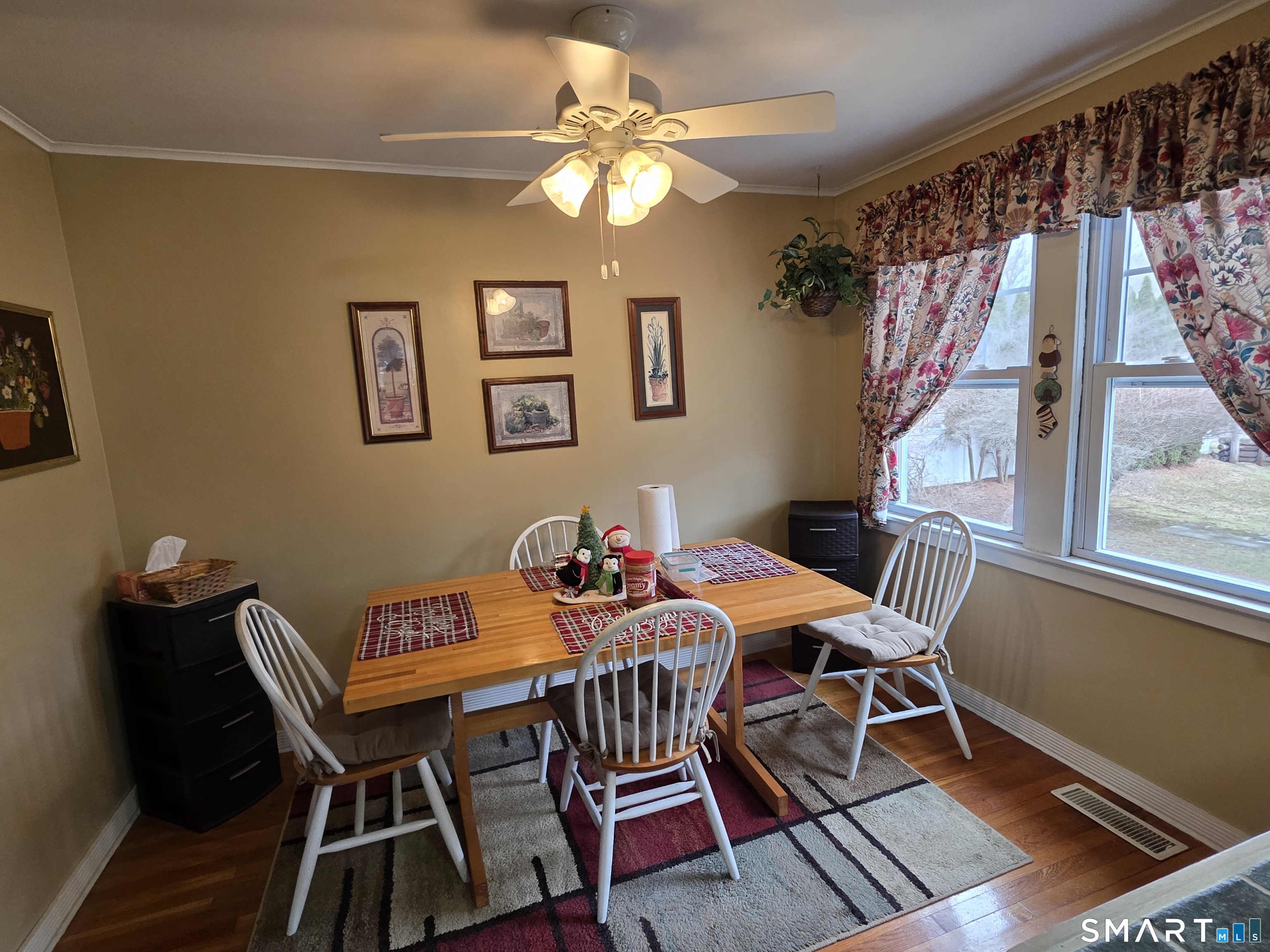 22 Pond Road Franklin, CT 06254 - Photo 8 of 34 a view of a dining room with furniture and a chandelier