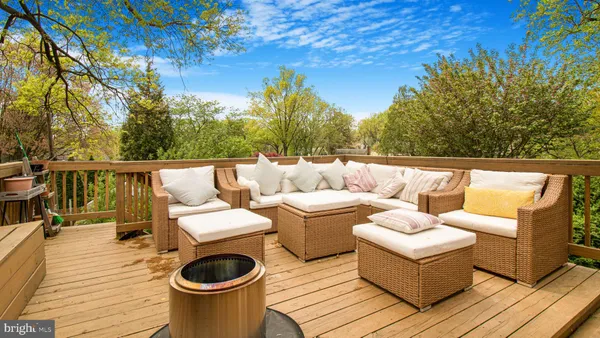 a view of backyard of house with green space