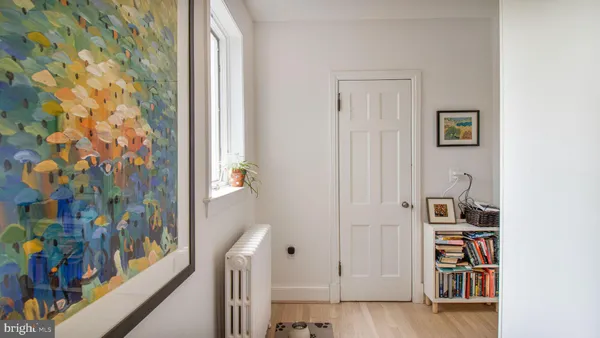 a view of a living room and dining room