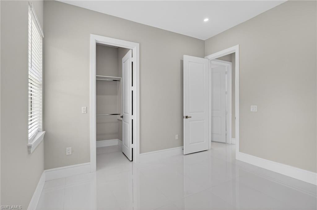 563 15th Street Northwest Naples, FL 34120 - Photo 13 of 22 a view of an empty room