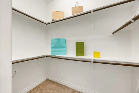 a view of a storage & utility room with a window