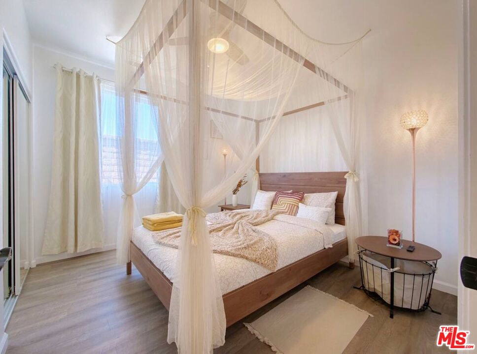 80718 Mountain Mesa Drive Indio, CA 92201 - Photo 17 of 43 a bed room with a bed and a chair