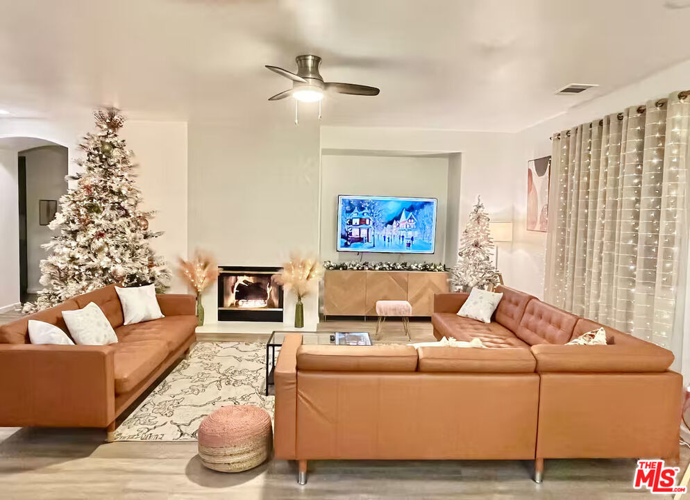 80718 Mountain Mesa Drive Indio, CA 92201 - Photo 21 of 43 a living room with furniture and a couch