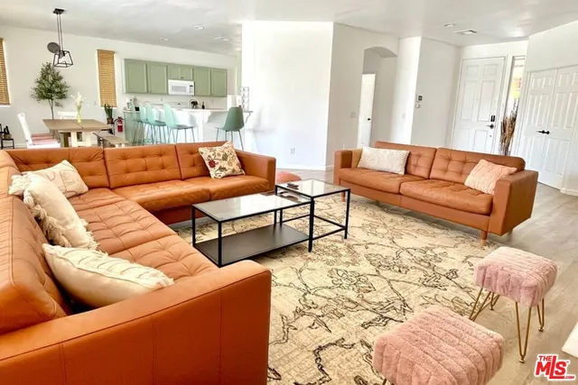 a living room with furniture and a couch