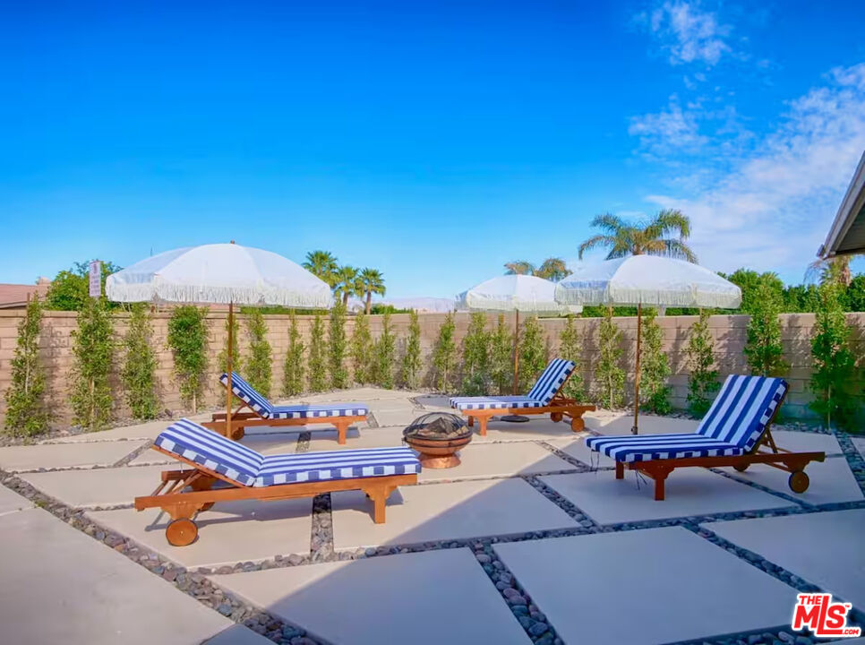 80718 Mountain Mesa Drive Indio, CA 92201 - Photo 34 of 43 a outdoor space with patio furniture