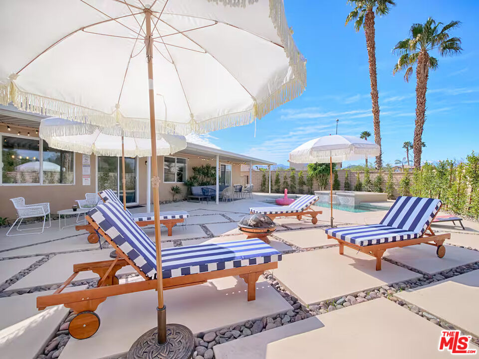 80718 Mountain Mesa Drive Indio, CA 92201 - Photo 37 of 43 a outdoor space with patio lots of furniture
