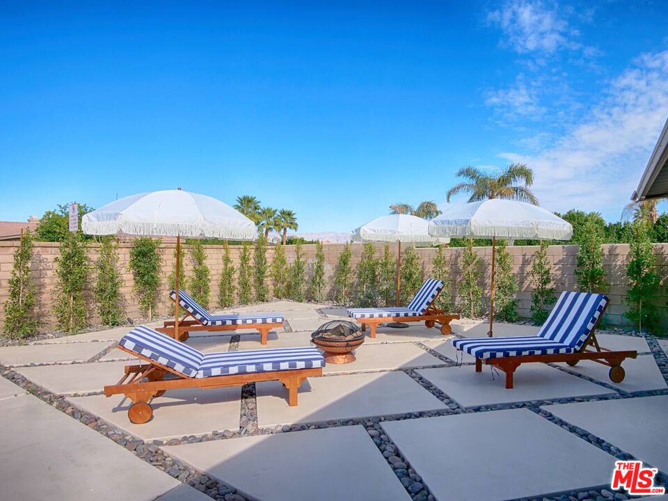 80718 Mountain Mesa Drive Indio, CA 92201 - Photo 38 of 43 a outdoor space with patio furniture