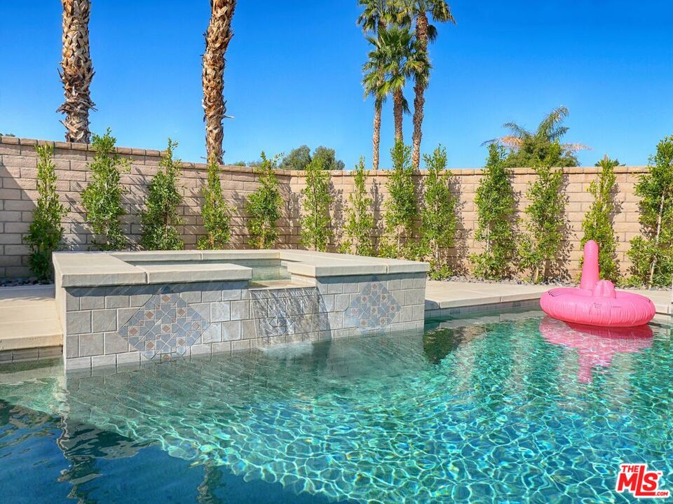 80718 Mountain Mesa Drive Indio, CA 92201 - Photo 39 of 43 a view of a water fountain and a bench