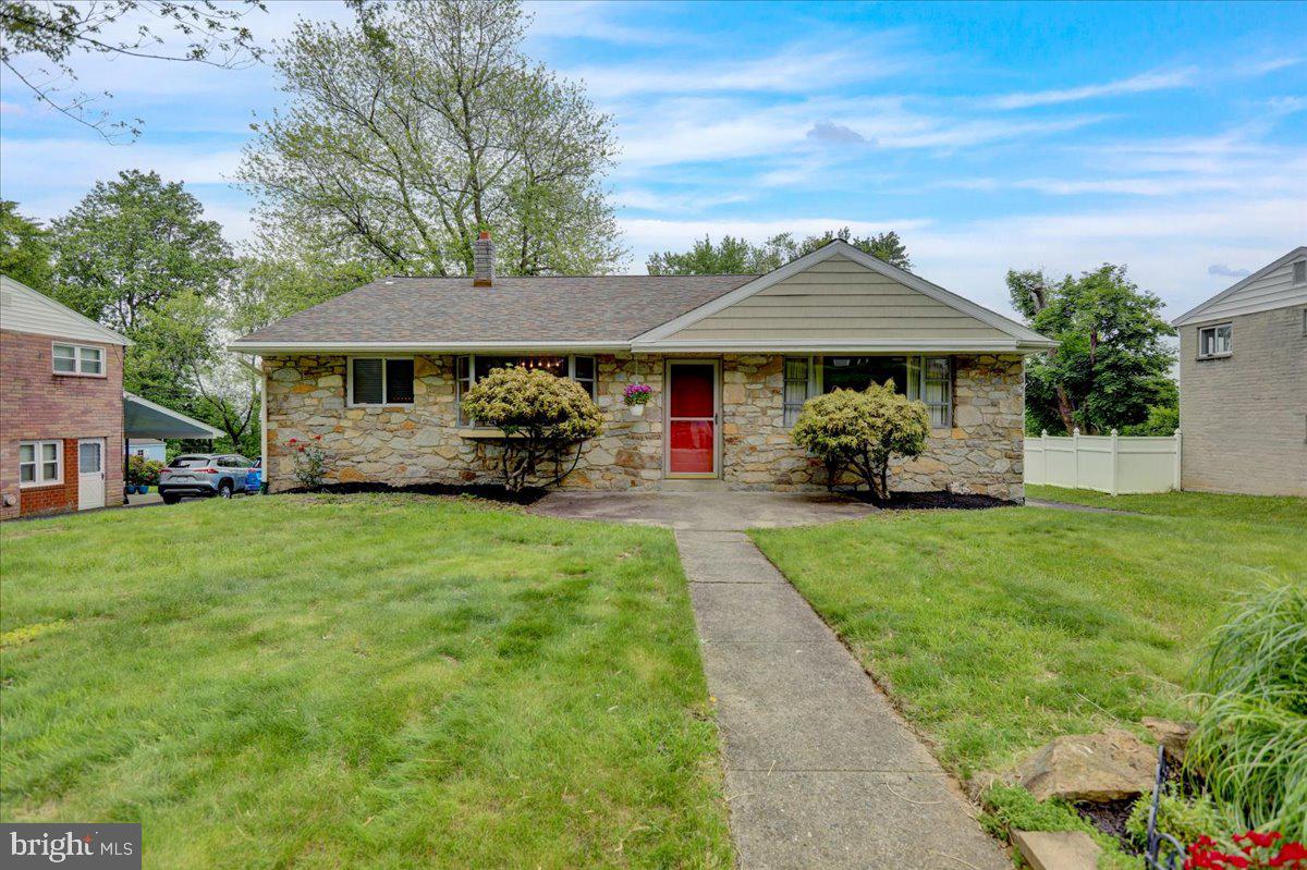 2304 Alsace Road Reading, PA 19604 - Photo 1 of 38 a front view of a house with a garden