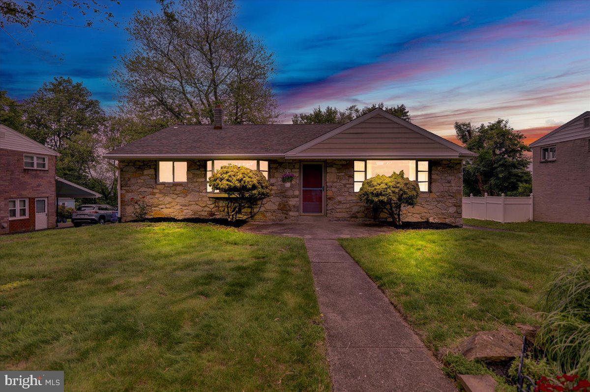2304 Alsace Road Reading, PA 19604 - Photo 2 of 38 a front view of a house with a garden and yard