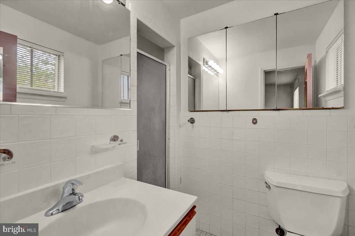 2304 Alsace Road Reading, PA 19604 - Photo 21 of 38 a bathroom with a sink toilet and shower