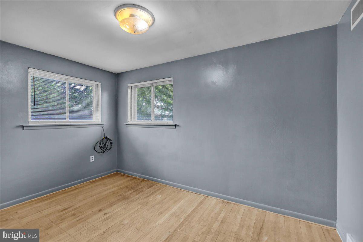 2304 Alsace Road Reading, PA 19604 - Photo 26 of 38 an empty room with windows and closet
