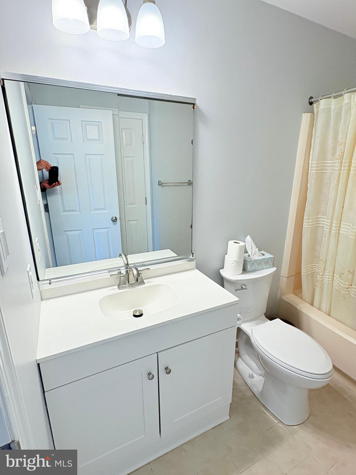 265 Barclay Court West Deptford, NJ 08051 - Photo 13 of 16 a bathroom with a sink a toilet a mirror and shower