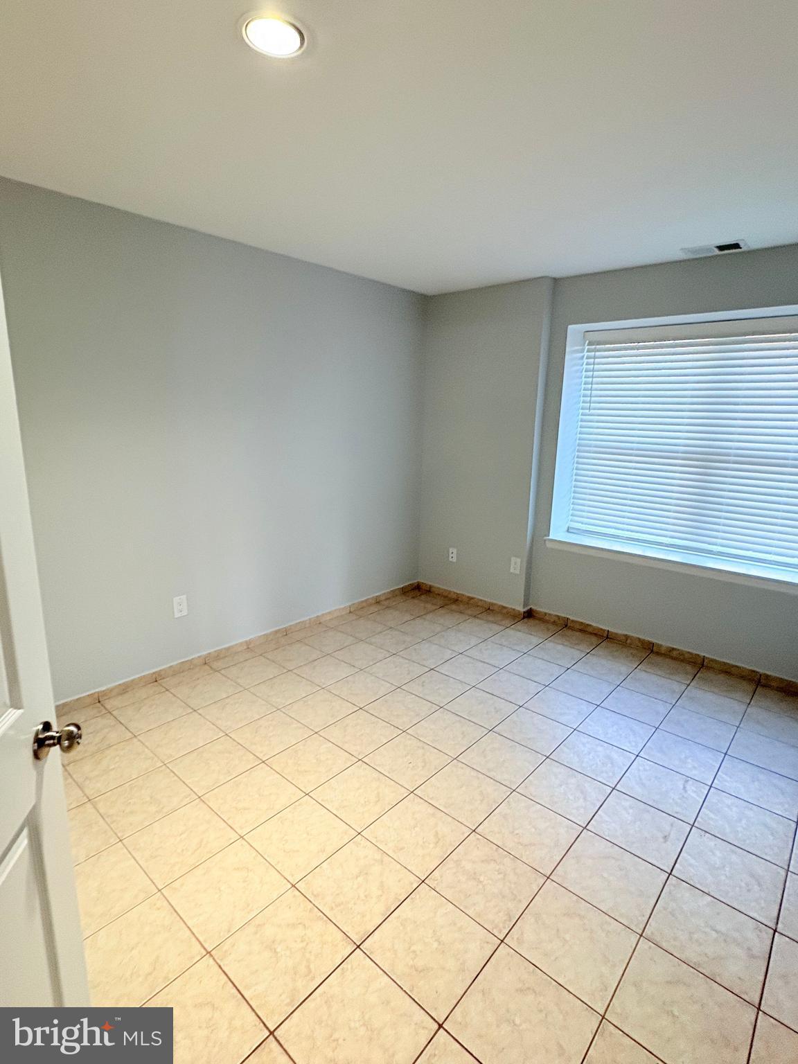 265 Barclay Court West Deptford, NJ 08051 - Photo 14 of 16 a view of an empty room and a window