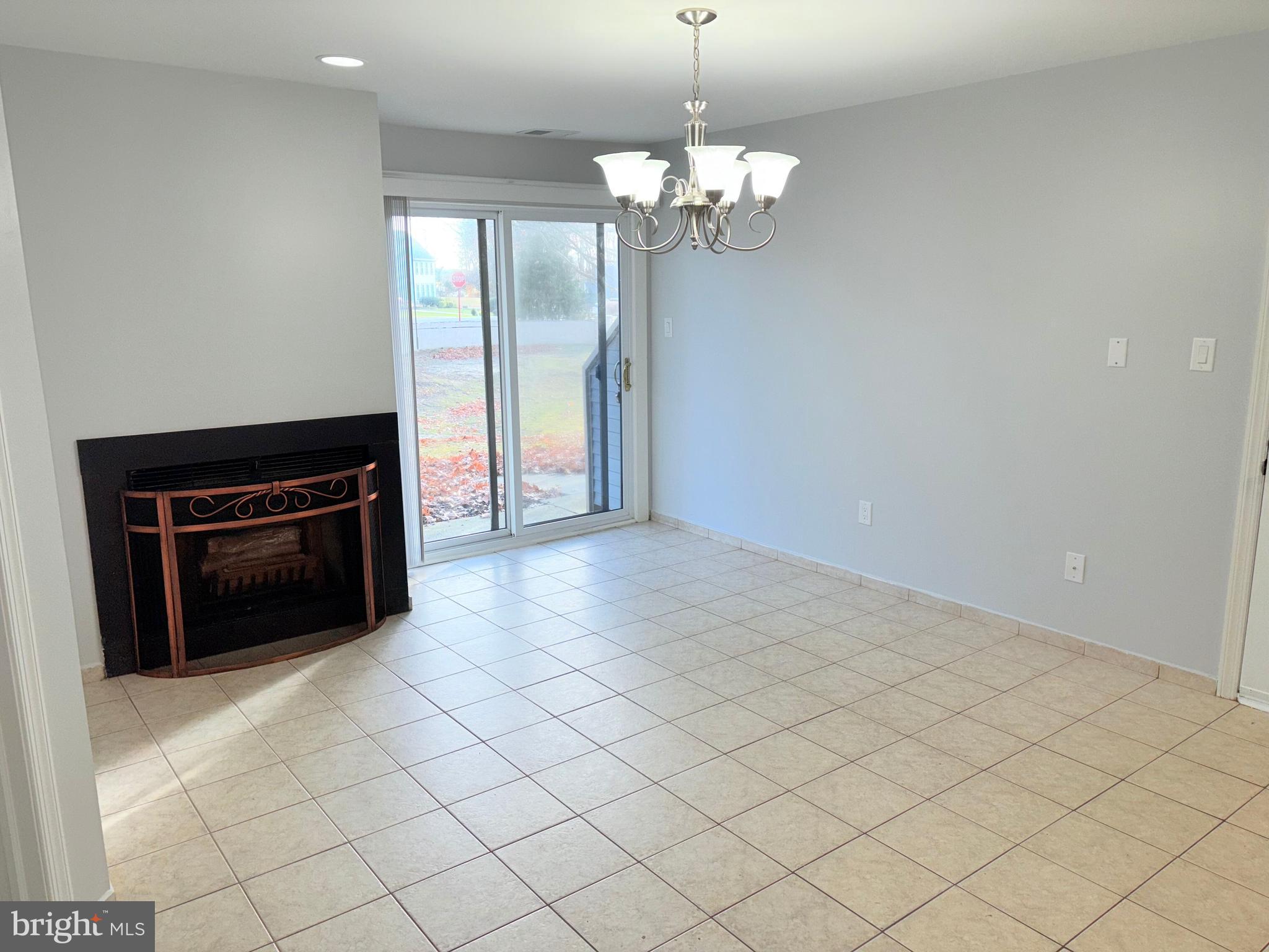 265 Barclay Court West Deptford, NJ 08051 - Photo 6 of 16 a view of a livingroom with a chandelier