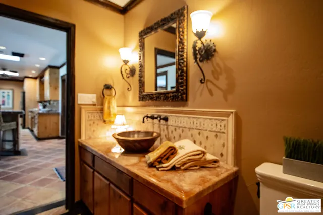 a living room with furniture fireplace and a table