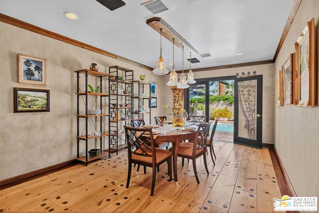 a view of a swimming pool with a patio