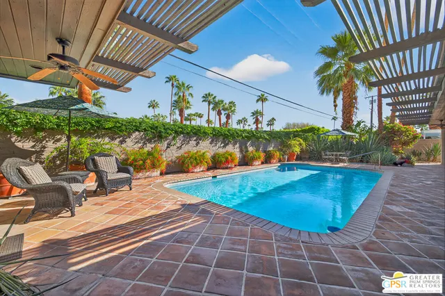 a view of a house with a swimming pool