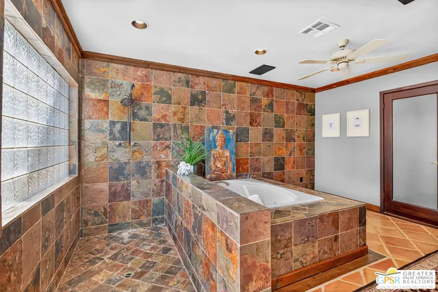 a bedroom with a bed and a table in it