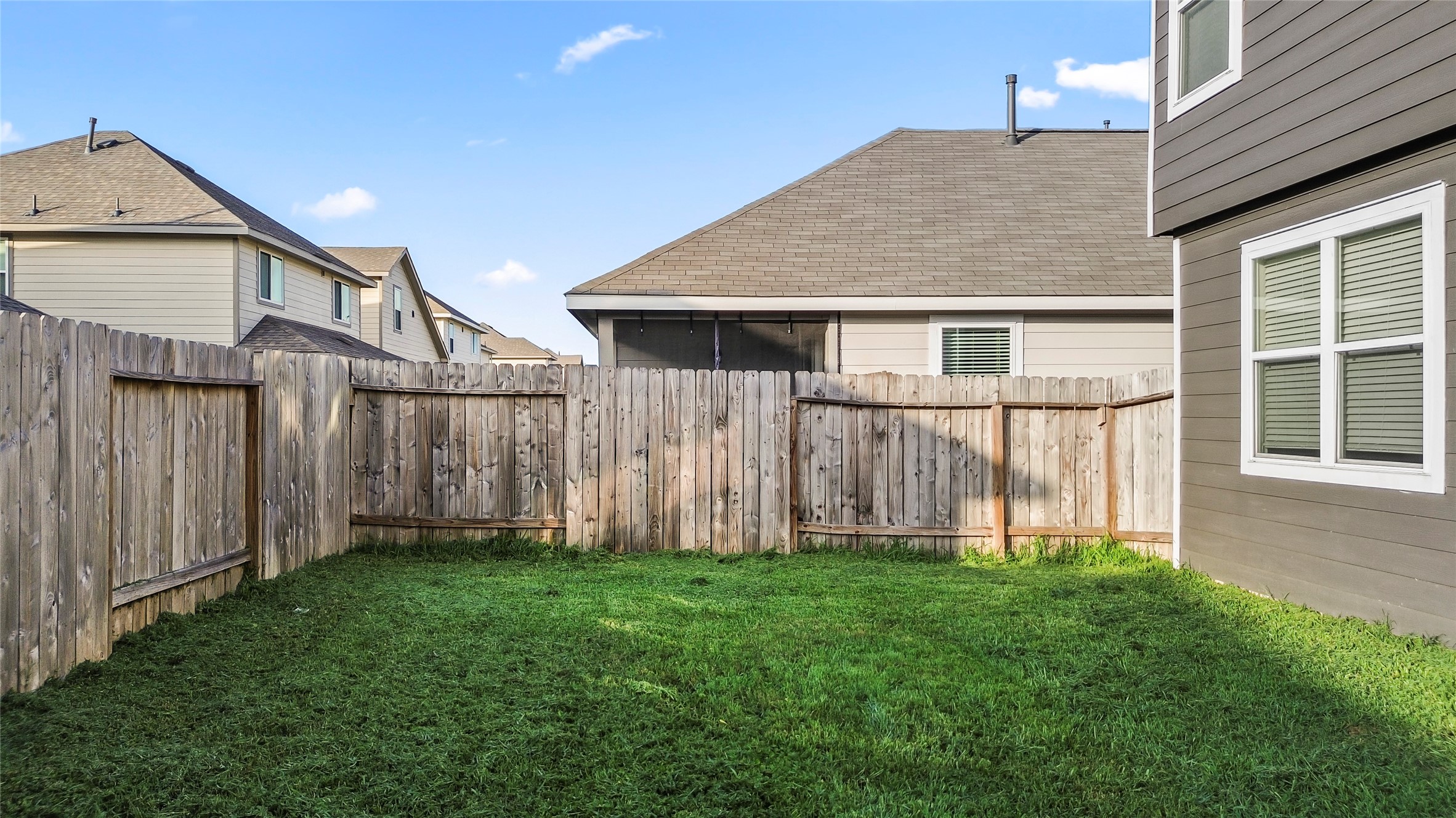 4831 Blue Jacaranda Way Spring, TX 77373 - Photo 23 of 24 a front view of a house with garden