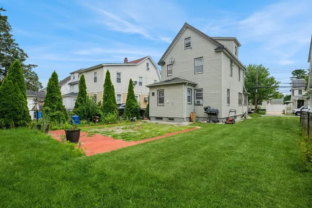 a front view of house with yard