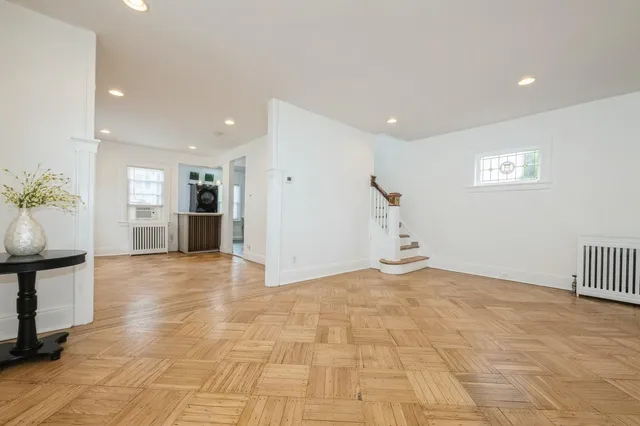 a view of an empty room with a window