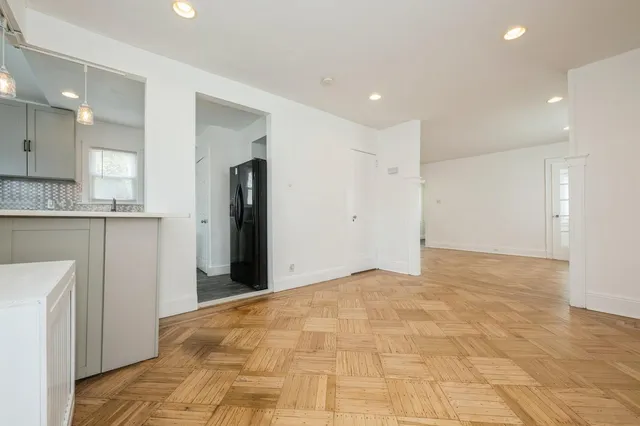 a view of a kitchen with a sink