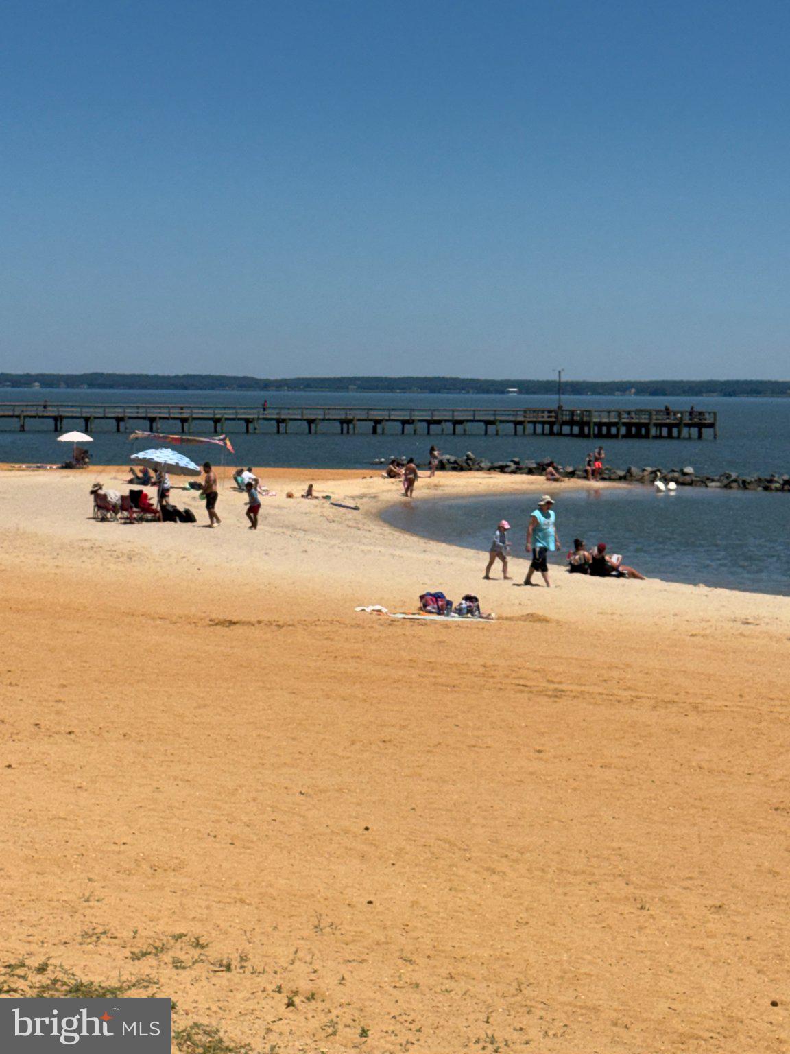 32 Placid Road Colonial Beach, VA 22443 - Photo 4 of 80 Sunny beach day by the serene shore.