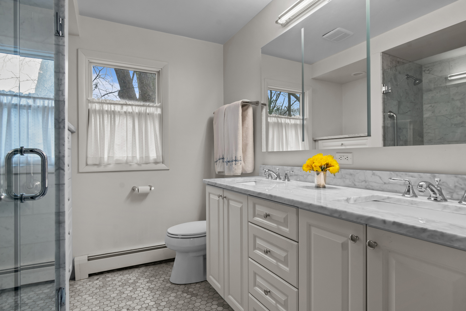 595 Washington Road Lake Forest, IL 60045 - Photo 18 of 28 a bathroom with a granite countertop sink a toilet and a mirror