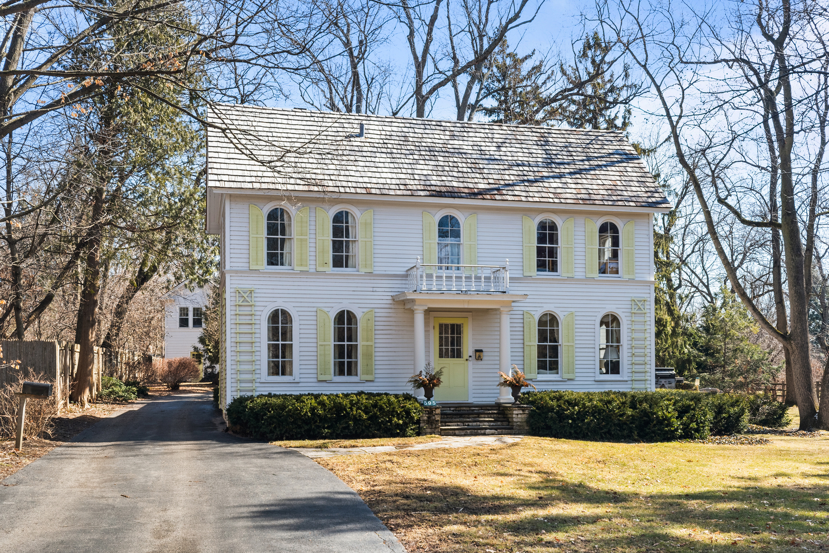 595 Washington Road Lake Forest, IL 60045 - Photo 2 of 28 a front view of a house with a yard