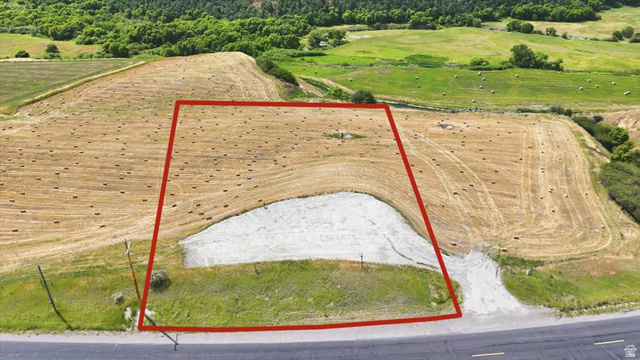4250 East Cub River Road Preston, ID 83263 - Photo 2 of 18 Expansive land parcel with surrounding agricultural fields