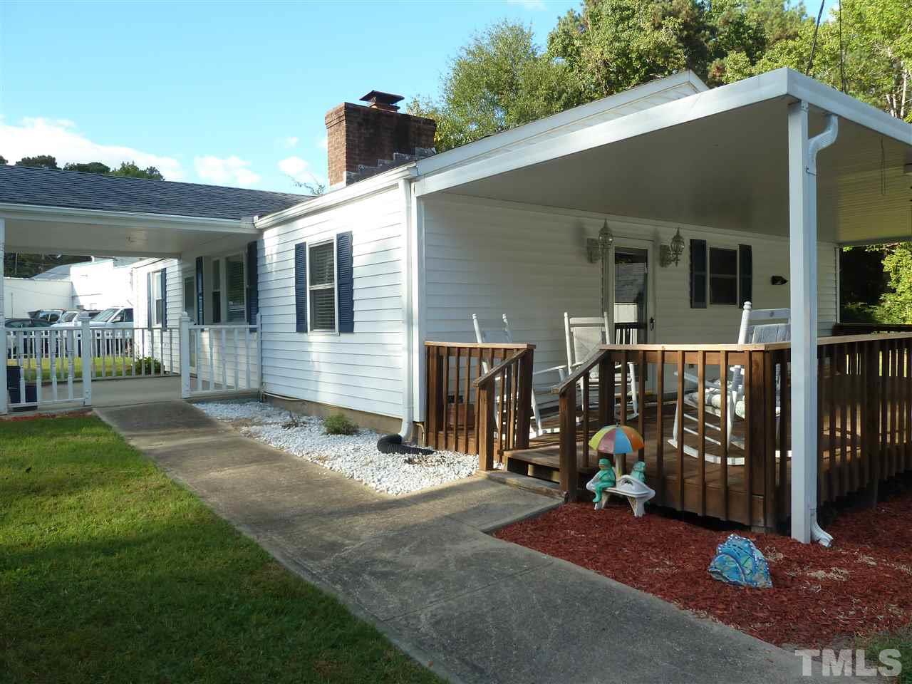 1122 Arvin Road Durham, NC 27704 - Photo 2 of 9 a view of a house with backyard