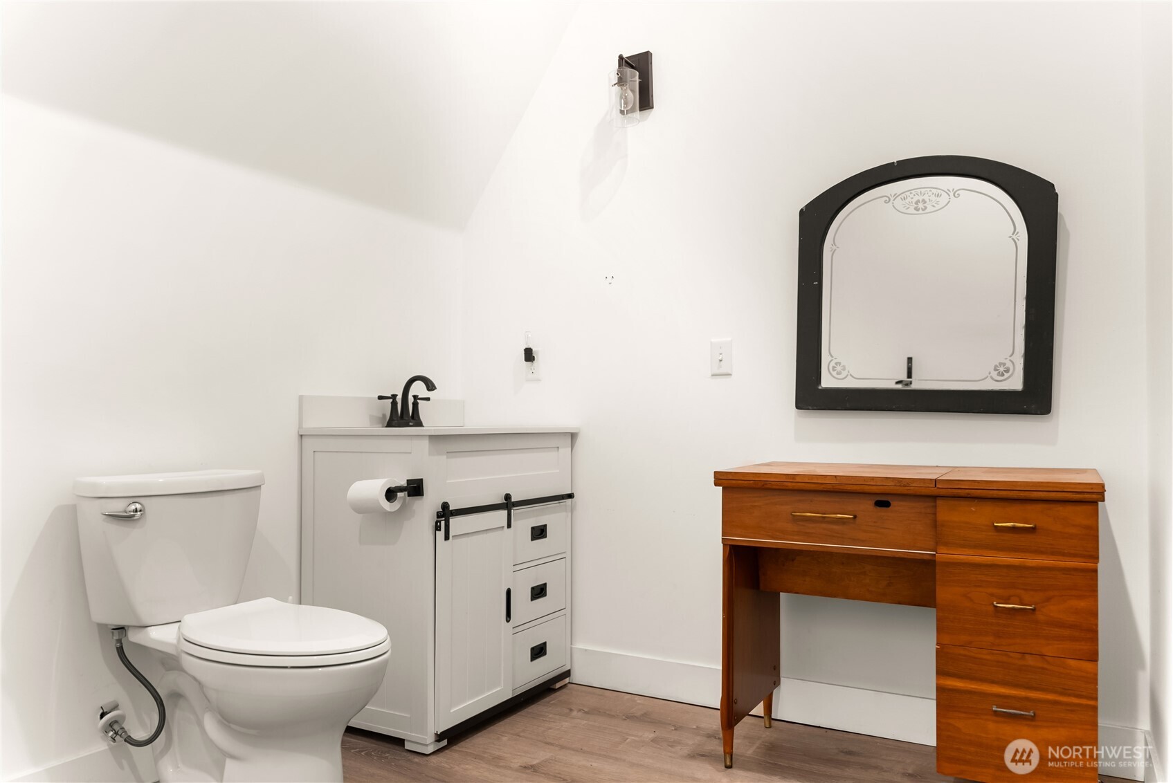 211 West Buttermilk Creek Road Twisp, WA 98856 - Photo 15 of 40 a bathroom with a toilet sink and mirror